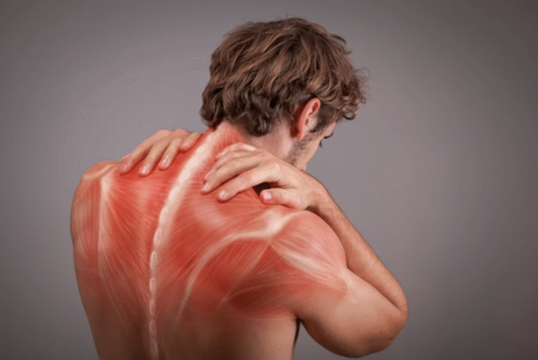 Man holding his painful shoulder